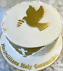 single tier christening cake with gold dove and cross