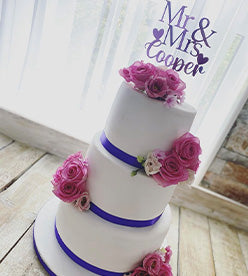 3 tier wedding cake with flowers
