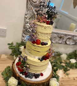 3 tier naked wedding cake with fruit
