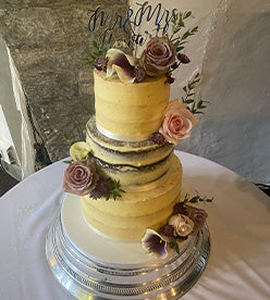 3 tier naked wedding cake with flowers